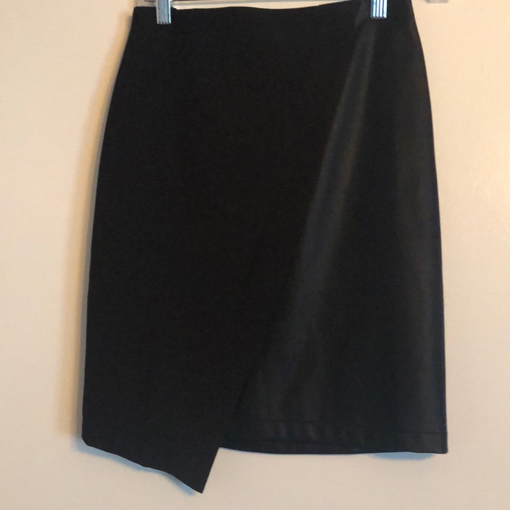 Pencil skirt with leather detail.